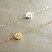 Tiny Skull Bracelet in Gold