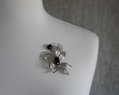 VINTAGE Western Germany brooch signed silvertone floral filigree with black cabochons excellent condition