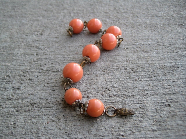 VINTAGE bracelet beaded salmon color likely Bakelite excellent condition