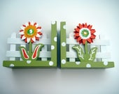 Handpainted flower bookends customized to match bedding