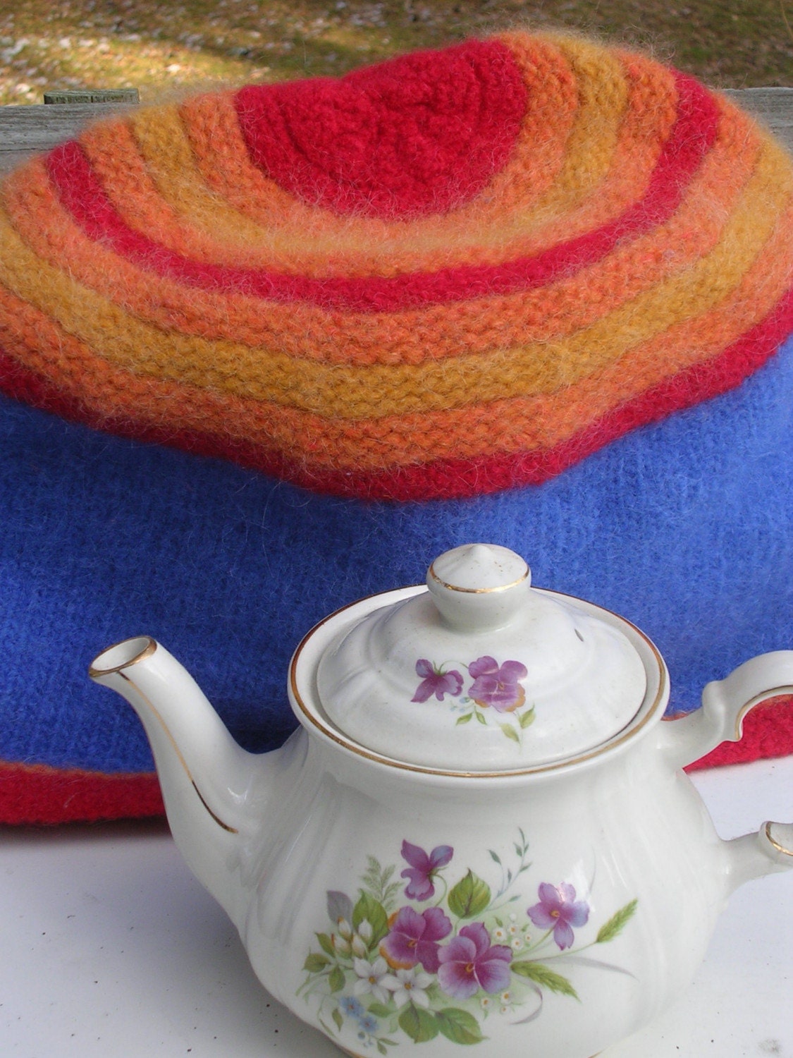 Hand Felted Electric Blue Tea Cozy with Yellow, Red and Orange Circles