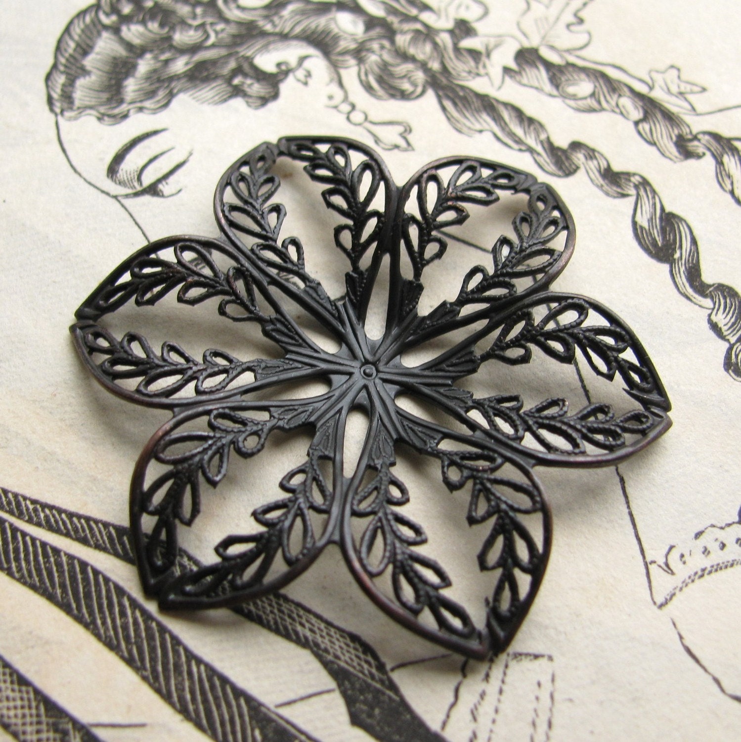 Leaf lined  flower filigree, aged black patina, dark antiqued brass, 42mm bednable wrap or ornament, made in the USA, lead nickel free