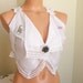 White cotton lace tank top camisol blouse with buttoned felt brooch