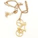 Wild Thing BICYCLE golden pendant