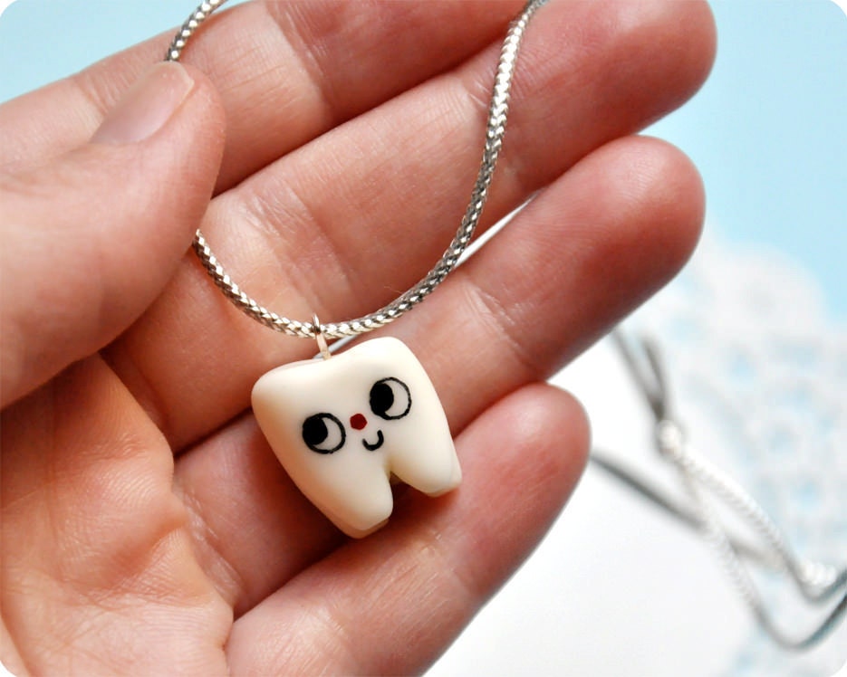 Smiling Tooth necklace cold porcelain clay