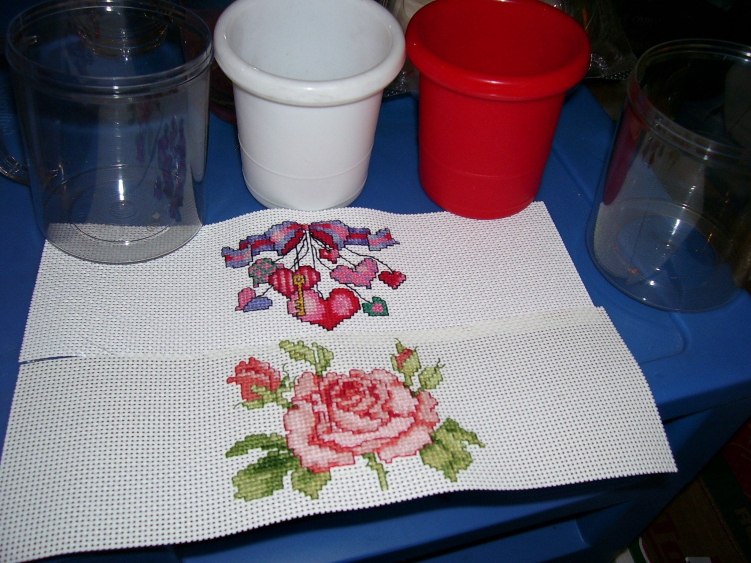 3 pieced plastic cup with counted cross stitched insert