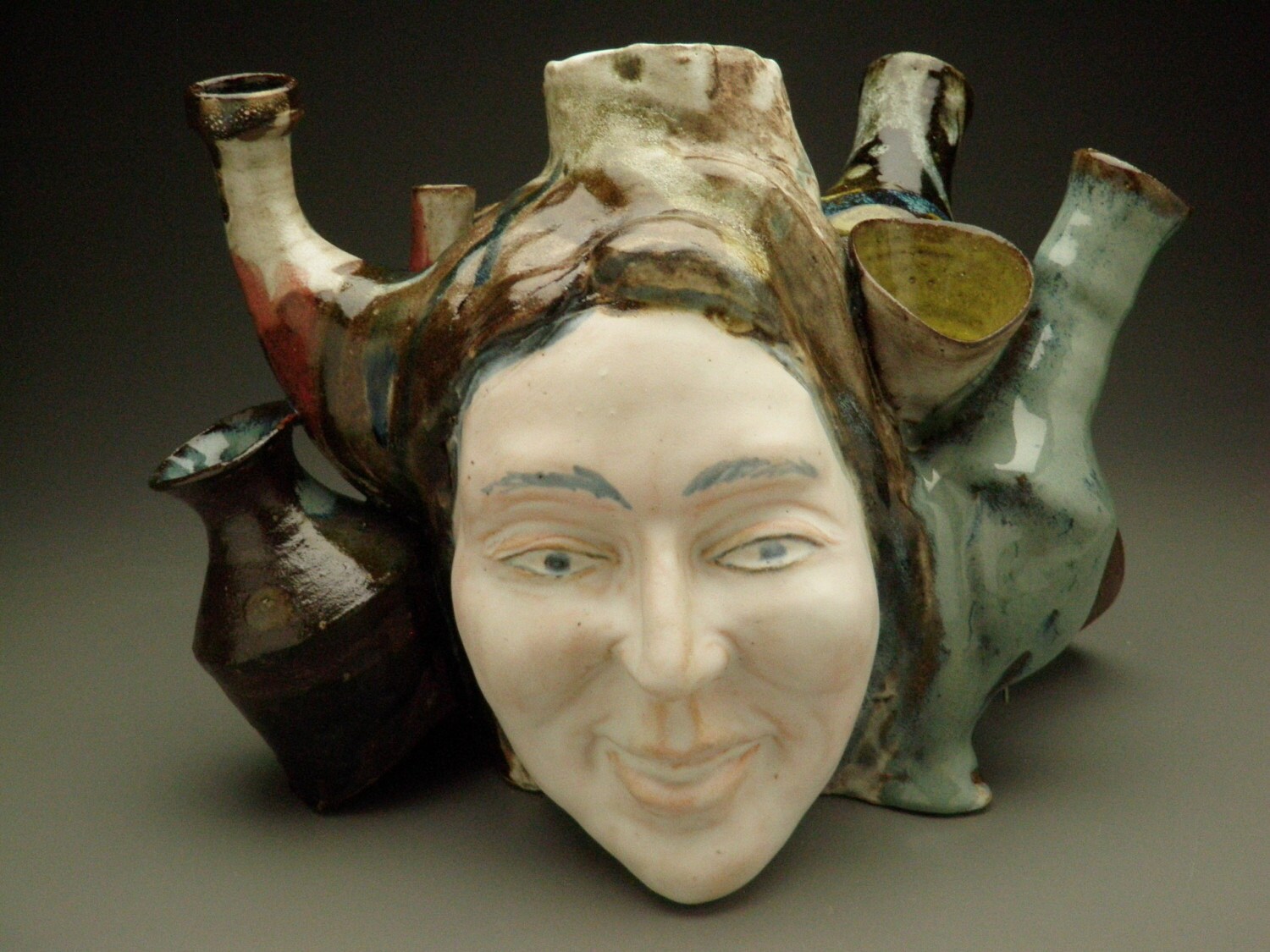 ceramic face sculpture