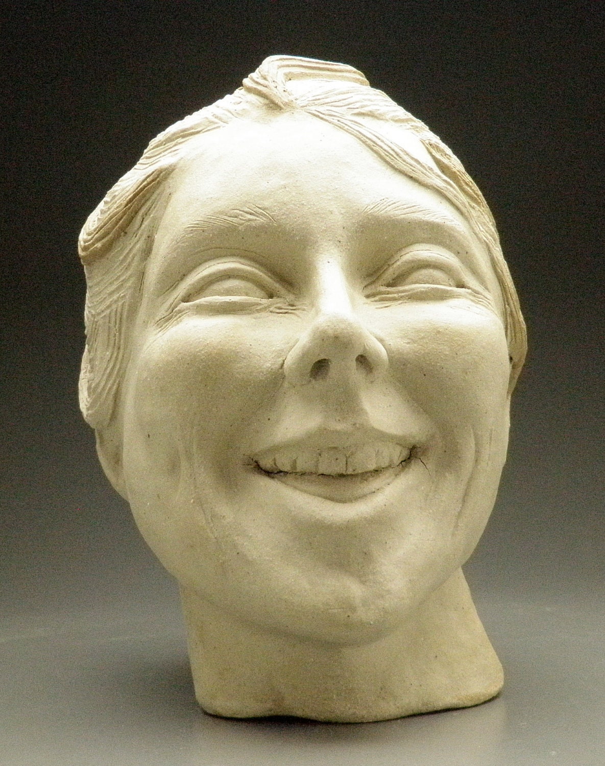 ceramic face sculpture