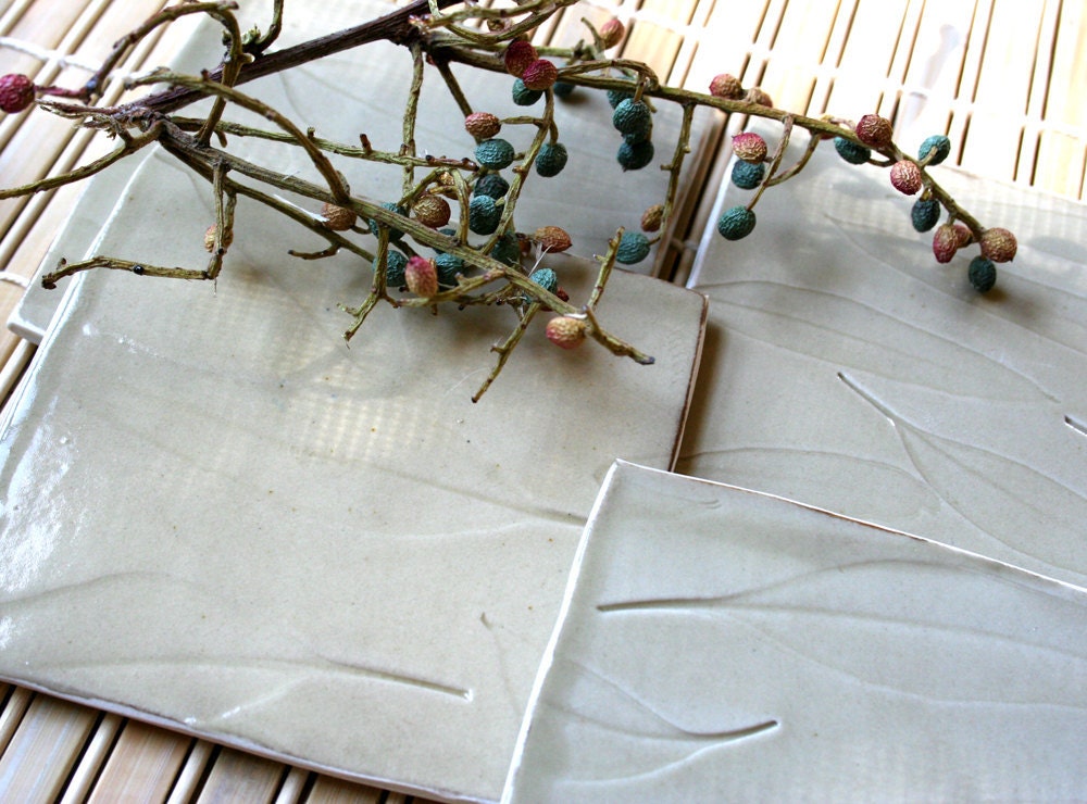 Set of four porcelain coasters with leaf pattern in celadon