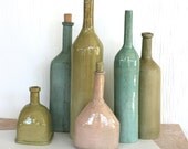 Still life of six bottle forms