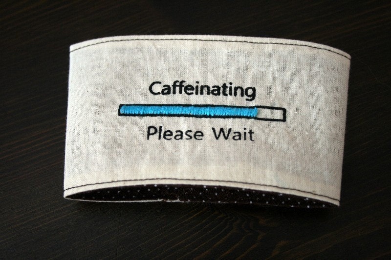 Caffeinating please wait cup cozy