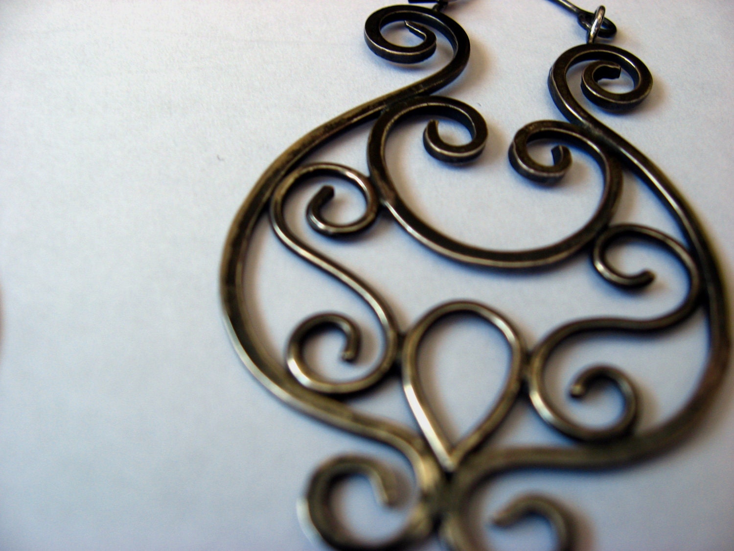 Silver wire scroll earrings with patina