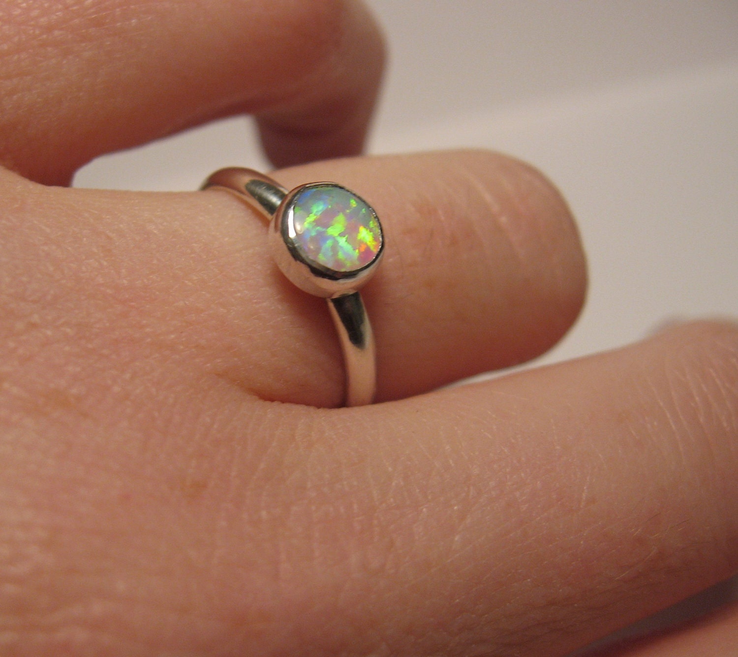Cute opal ring in sterling silver for stacking or solo wear