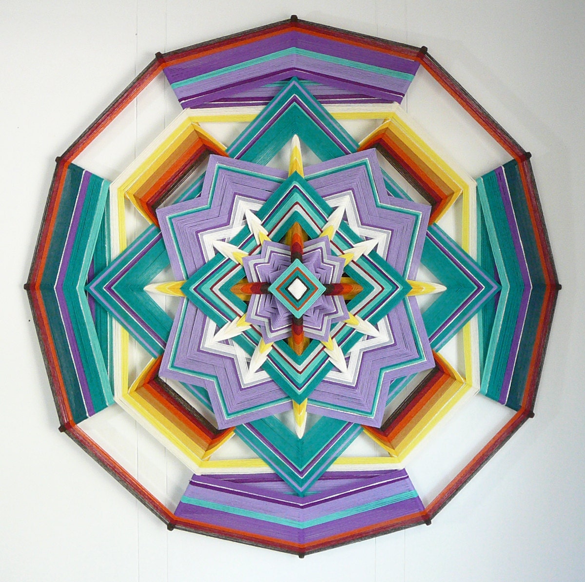 Mariposa Hermosa (beautiful butterfly), a 36 inch, 12-sided, Ojo de Dios mandala
