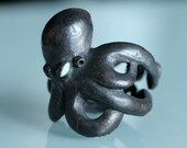 Octopus ring Sterling black silver evil opal eyes  sized  7 to 11  original design carved cast and finished in NYC