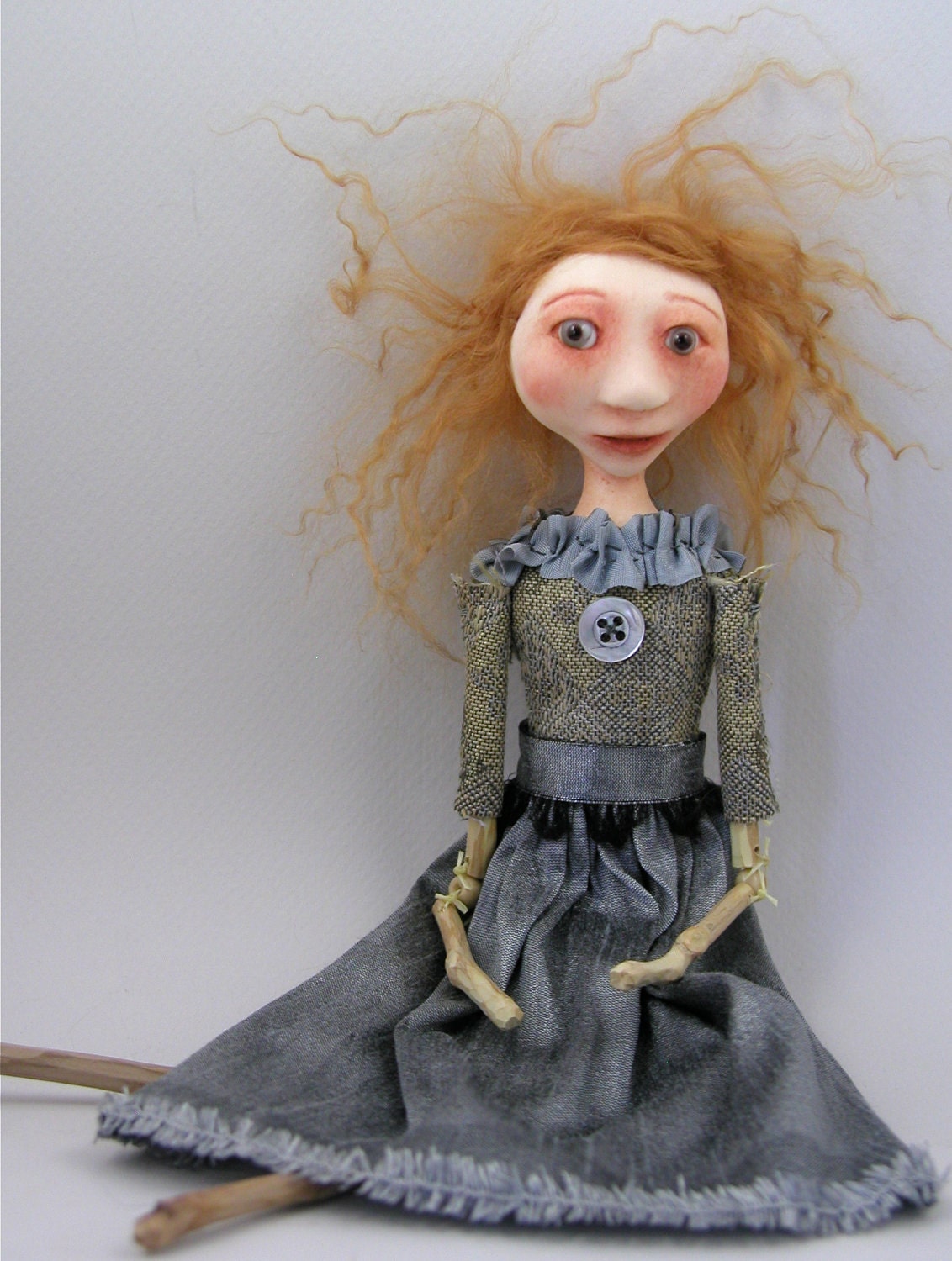 Folk Art doll sculpted cloth and clay strawberry blonde hair bead jointed limbs