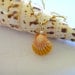 Sunrise Shell on Gold Braided Cord with Pearls and Apatite