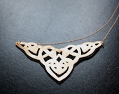 Arabesque Statement Necklace made of gold leather and black satin backing