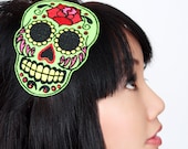 Sugar skull headband Dia de los muertos, in green with red rhinestones