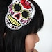 Sugar skull headband Dia de los muertos, in white with red rhinestones