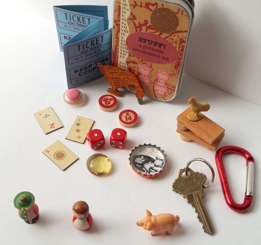 Toy set in a tin, pocket size amusement kit for kids, with vintage Sevi figures, wooden game pieces, and other random items