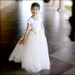 The Daffodil Tutu for Flower Girls. Six layers of butter yellow, lemon yellow and ivory tulle is sewn.