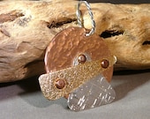 Sterling silver, copper and brass pendant
