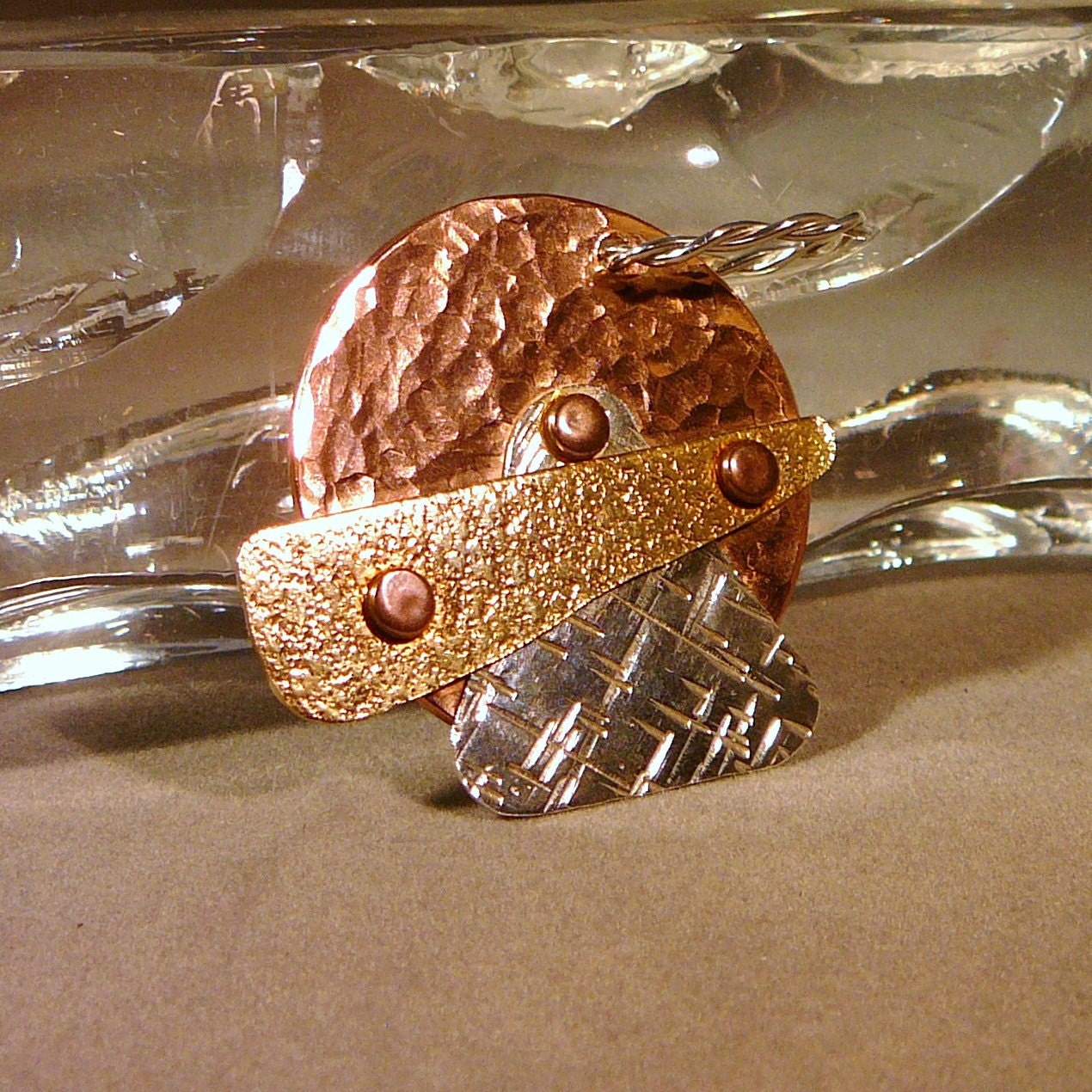 Sterling silver, copper and brass pendant