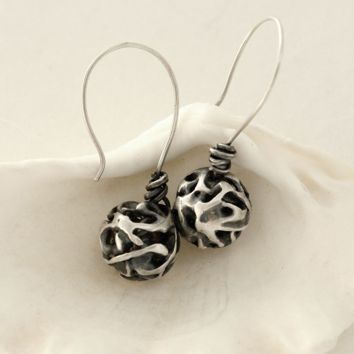 Melted Silver Chaos Dangling Globes