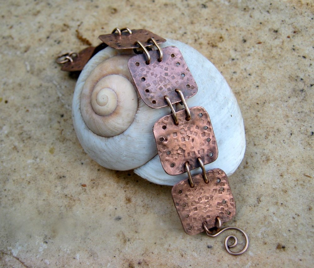 copper metal work bracelet with bronze wire
