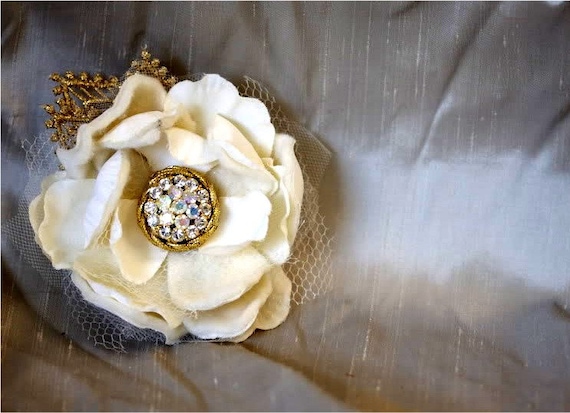Ivory flower clip with a jewel center