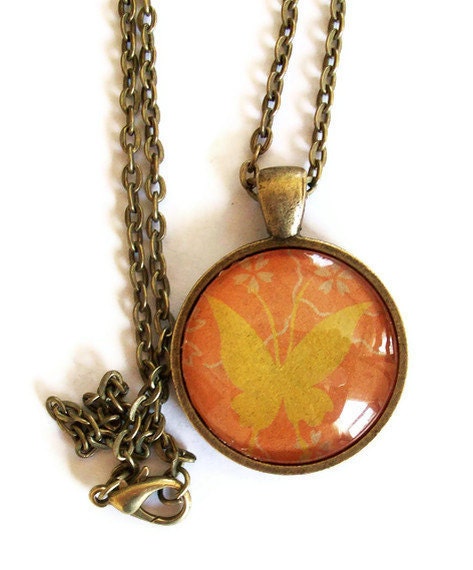 Butterfly Necklace, Gold on Orange Background