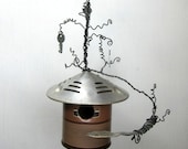 Interesting Brown Stiped Thermos Birdhouse With Keys