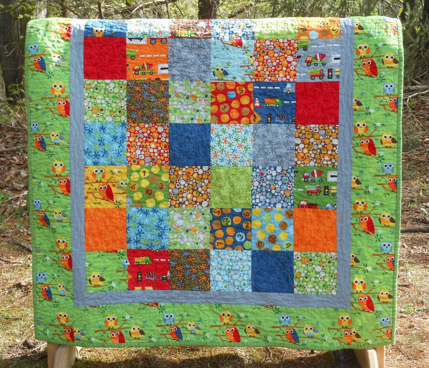 Baby Boy Quilt in Ten Little Things fabrics -- owls, trucks -- blue, green, red, orange -- chevron backing