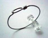 Bike jewelry made from a bicycle spoke into a bracelet that I call Plain Jane