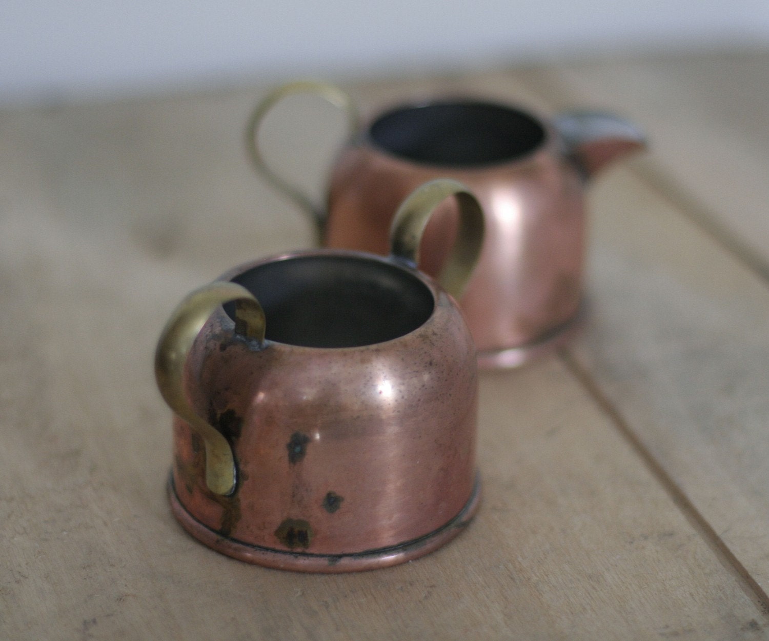Vintage copper cream and sugar