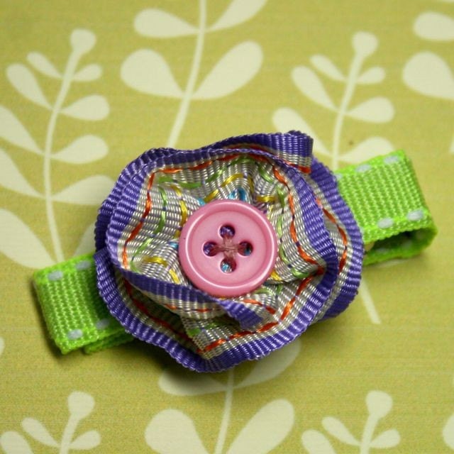 a pair of satin flower clips