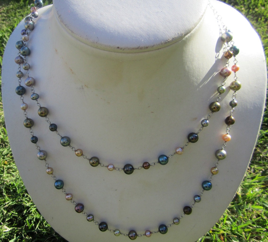 Pearl and silver chain layered necklace