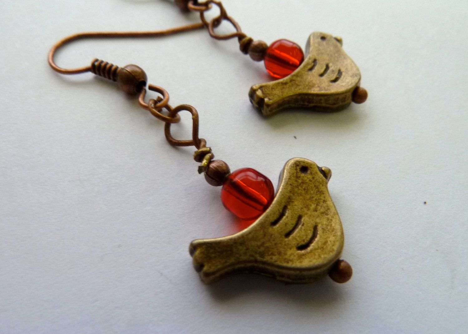 Bird caught on a wire Earrings