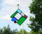 stained glass and bevel suncatcher green blue red aqua violet - it's a rainbow