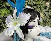 Blue Sky Thinking tribal headdress, white orchids and turquoise feather plume, with blue ribbon hair falls