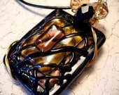 Pendant of Black Copper Rectangle Lampwork Glass Wire Wrap