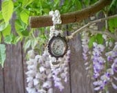 Beautiful foux pearl and crystal watch fabulously functional
