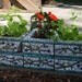 Upcycled mosaic herb garden planter with olive branch pattern