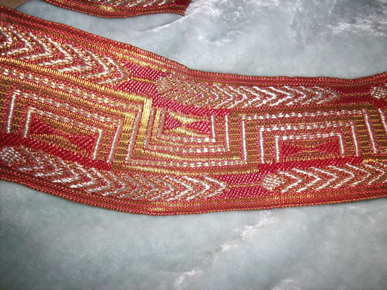 1 yd. of antique metal trim . Beautiful shade of red with gold & silver, More avail.