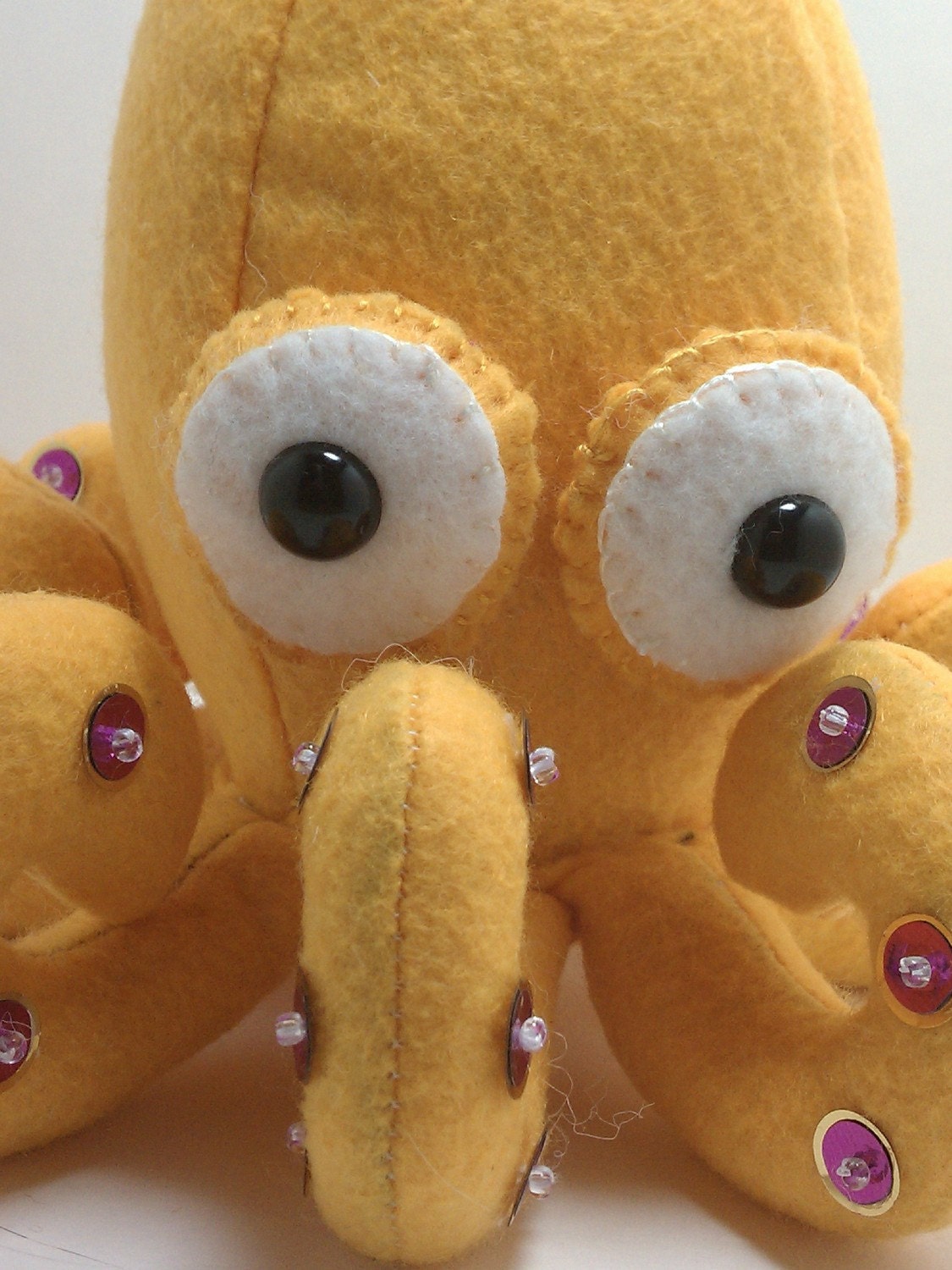 Octopus plush- golden yellow with purple