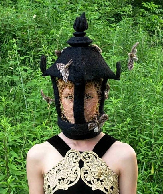 MOTH LAMP HAT -- Needle Felted Wool with golden crochetted light panels that moths are swarming around.
