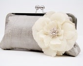 Flower embellished clutch bag