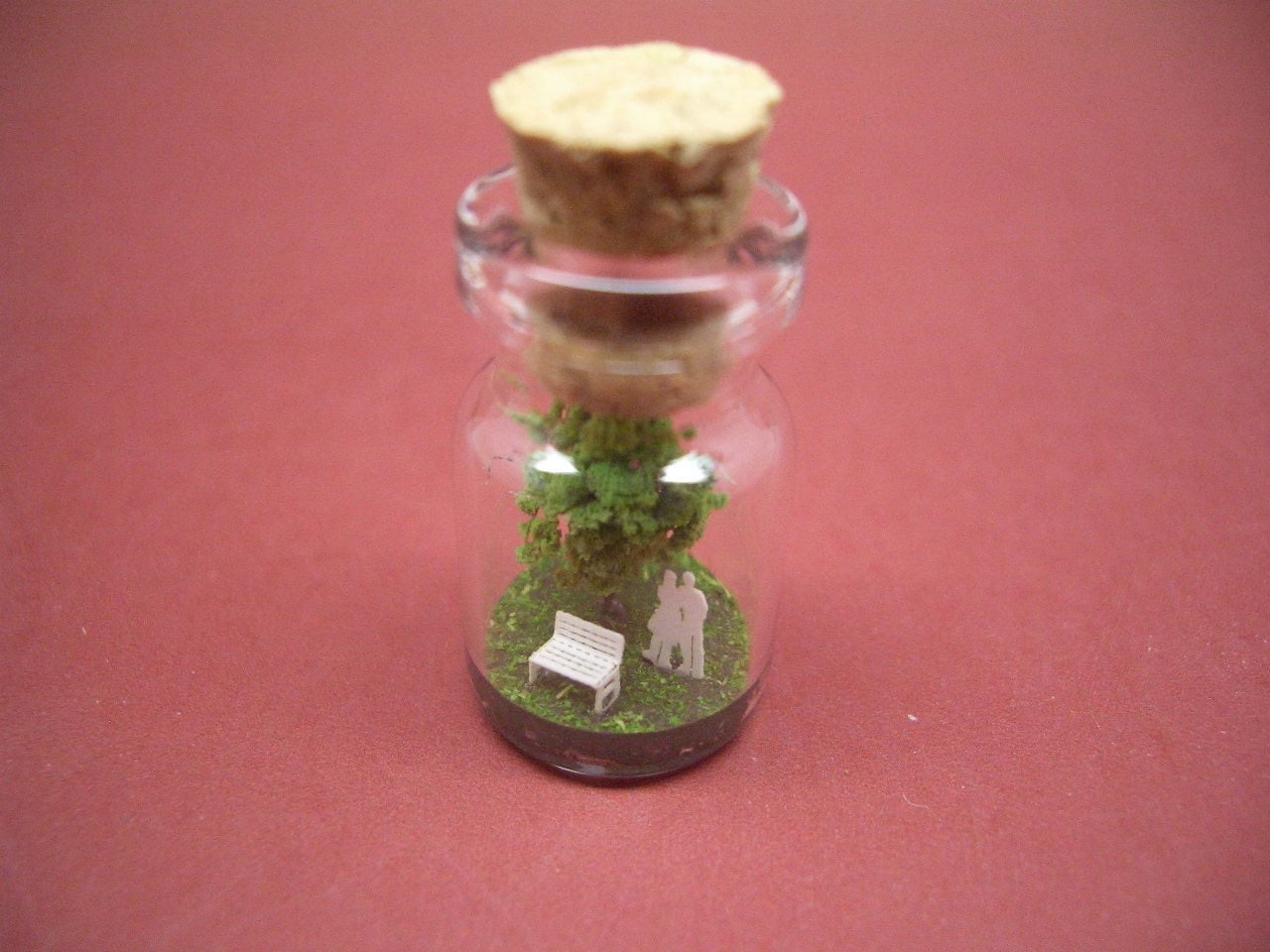Tiny green tree and a couple in a tiny bottle ver.2