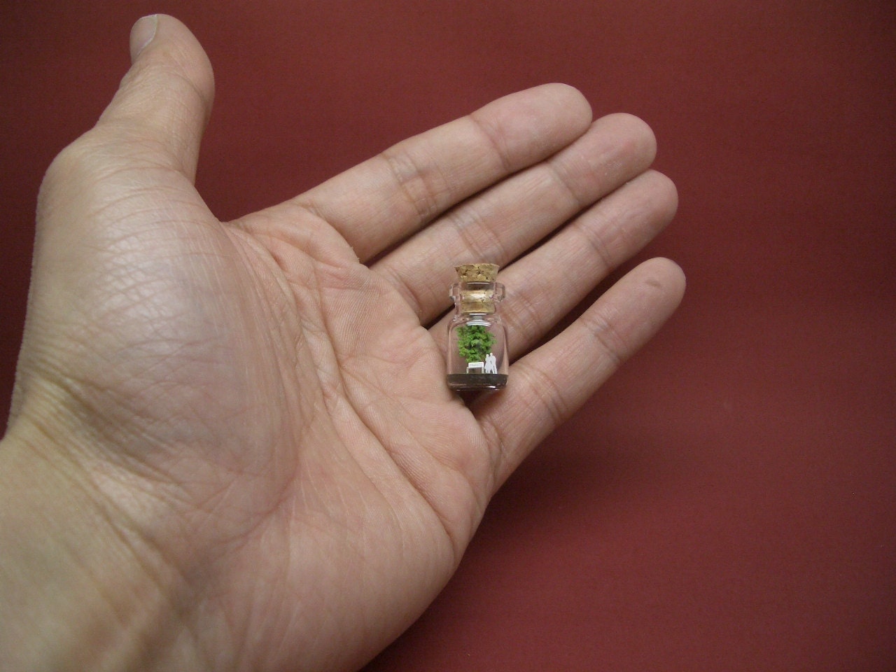 Tiny green tree and a couple in a tiny bottle ver.2